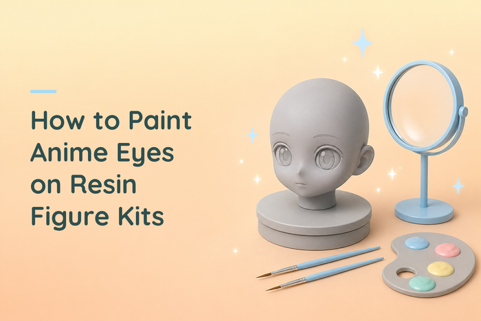 Grey resin figure head with large anime eyes beside two fine detail brushes and a palette of pastel paint blobs