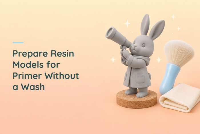 Grey rabbit astronomer resin figure beside a soft brush and cloth, with the primer preparation guide title