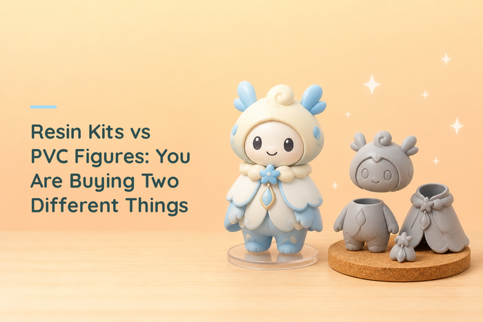 Cozy illustrated painted figurine on a clear stand beside the same character unpainted in grey resin parts on a disc