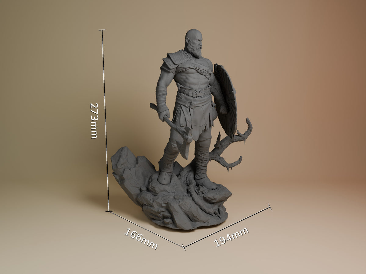 Kratos resin figure from God of War shown at scale (273mm height) in unpainted gray, standing on rocky base with axe and shield, side angle view.