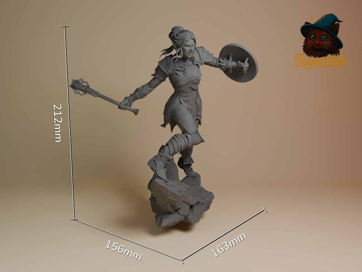 Three-quarter Minthara from Baldur's Gate is an unpainted resin figure with shield and mace on a rocky base.