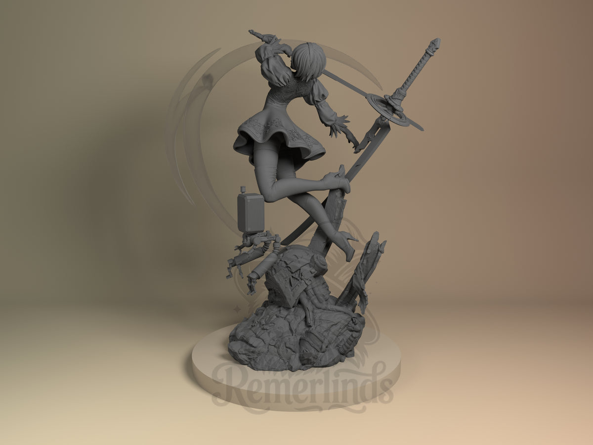 2B from NieR: Automata is an unpainted resin figure shown from behind, leaping with a sword above a rocky base.