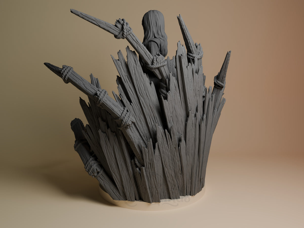 Alicia from Expedition 33 resin figure shown from left angle, unpainted gray, posed climbing jagged crystalline formations, circular base.