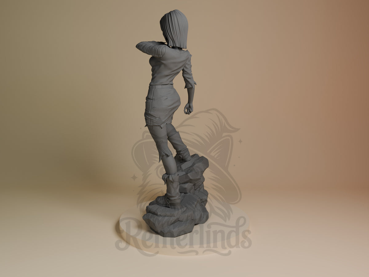 Rear three-quarter view of an unpainted Silver Cyborg resin figure from Dragon Sphere Y on a sculpted rocky base.