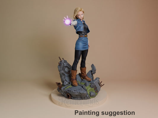 Blonde female resin figure in blue outfit casting purple energy, standing on rocky base with moss details, painted example.