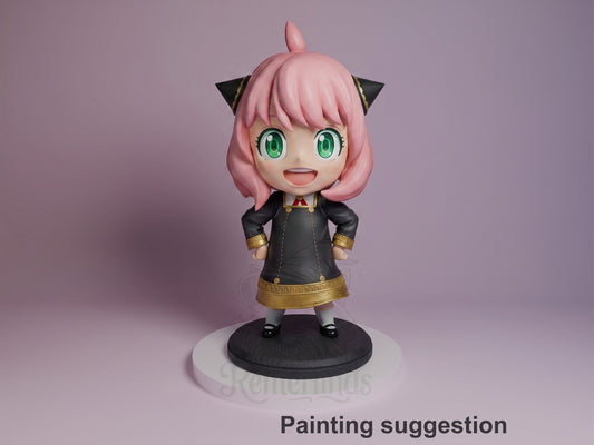 Anya Forger resin Chibi figure from Spy x Family, front view, smiling with green eyes, pink hair, black dress with gold trim, on black base against purple background.