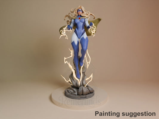 Blonde Blazer from Dispatch resin figure in blue bodysuit with yellow lightning effects, posed standing on rocky base with arms outstretched, fully painted.