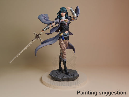 Ashen Scholar from Fire Symbol resin figure in dynamic pose wielding ornate sword and staff, painted with dark armor and blue cape on rocky base.