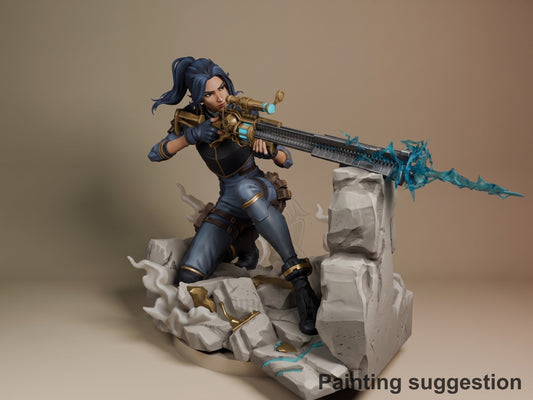 Caitlyn from Arcane 3D printed resin figure in painted blue and gold outfit, posed aiming her rifle on rocky base, front-angled view.