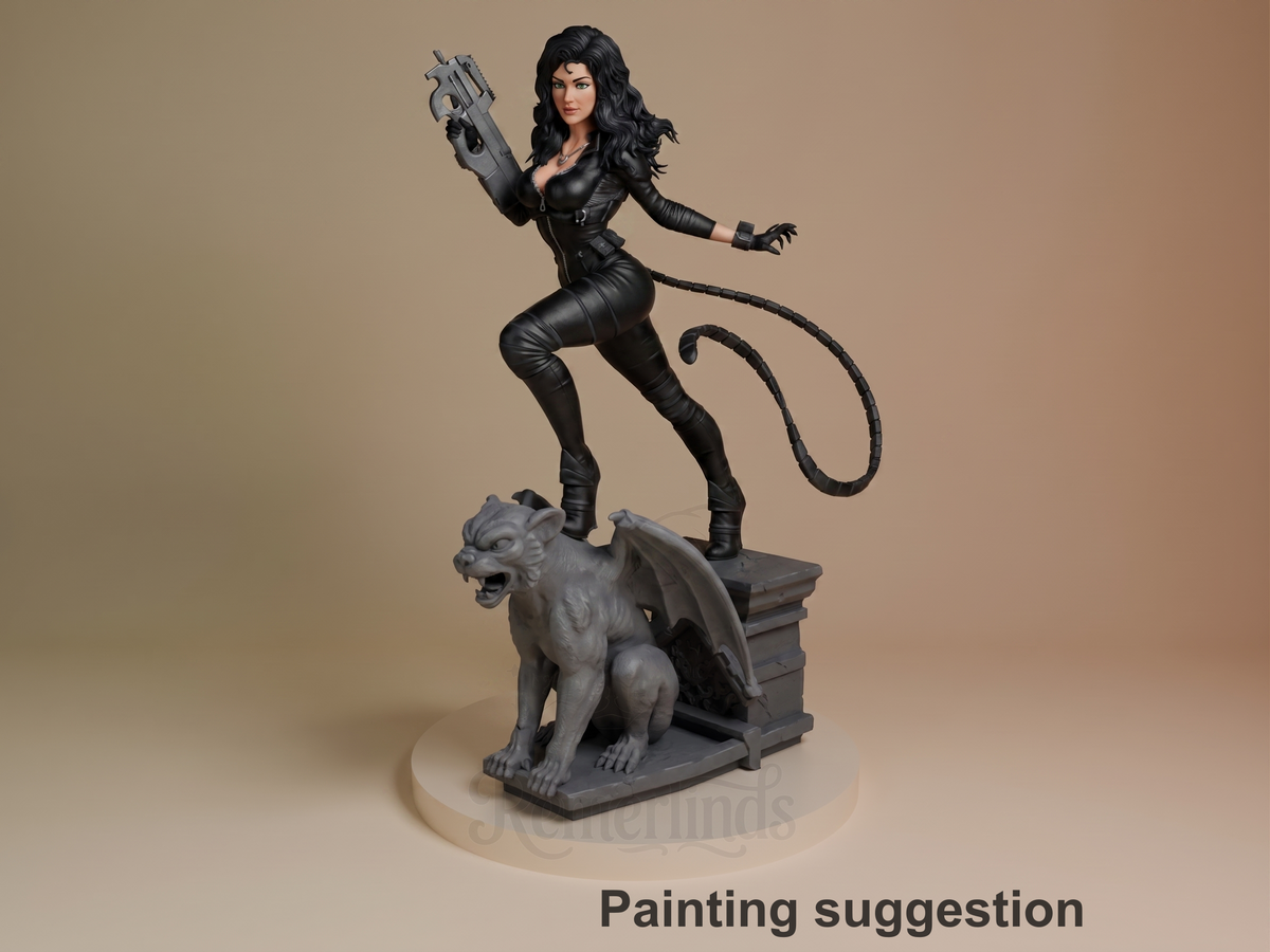 Three-quarter painted resin figure of Night Vigilante & Alley Cat from Batman on a sculpted book base.