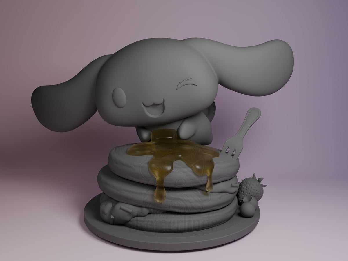 Cloud-Eared Pup Ribbon Town Pals 3D printed resin figure by Nomnom, unpainted front view. The figure shows a cute, chibi-style cloud-eared pup character sitting on a circular base with a stack of textured pancakes topped with dripping syrup. The pup has an expressive winking face and large ears extending sideways, with a fork stuck in the pancakes and small fruit details on the side, creating a whimsical and playful composition.