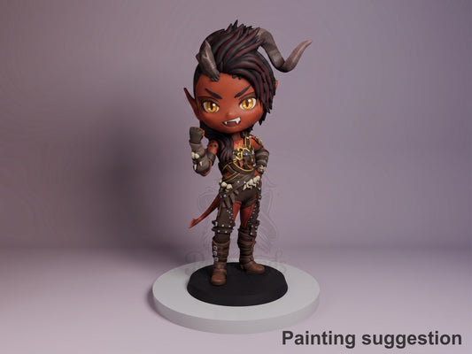 Karlach resin Chibi figure from Baldur's Gate 3, painted in dark skin tones with horns and gold eyes, posed standing on white base against purple background.