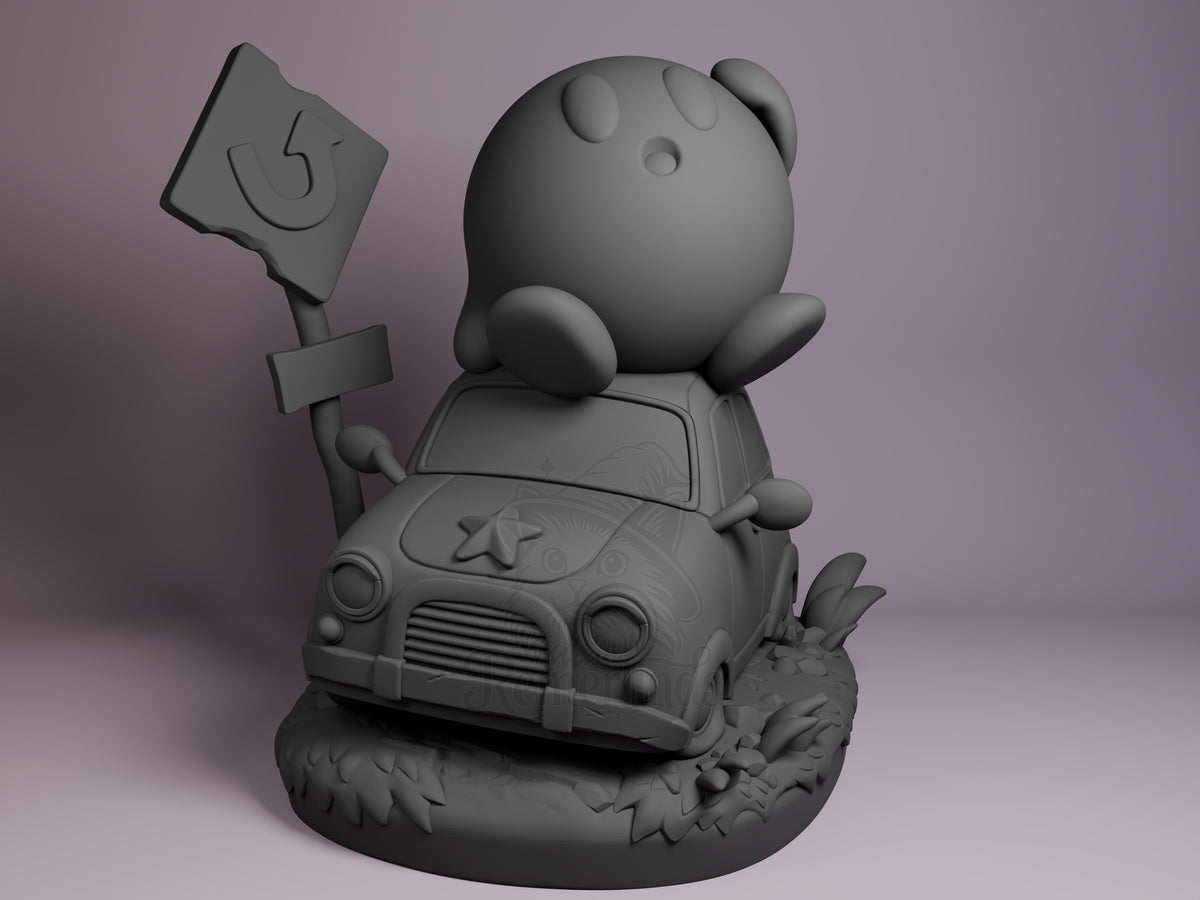 Kirby Dream Realm Adventure 3D printed resin Chibi figure by Nomnom, unpainted front view. This chibi figure depicts Kirby perched on a small car, sitting with legs raised and arms out slightly, suggesting a playful or surprised expression. The car features detailed elements including a star emblem on the hood and a surrounding base designed with grass and foliage. A bent arrow road sign stands beside the car, contributing to the whimsical and adventurous theme of the composition.