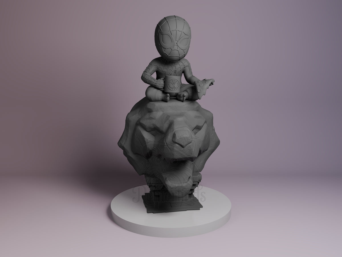 Webbed Guardian Spiderman 3D printed resin Chibi figure by Nomnom, unpainted front view. The figure depicts a chibi-style Spiderman sitting cross-legged on a carved rock base shaped like a fierce animal head, holding a spider-emblemed coffee mug in one hand and a slice of pizza in the other. The miniature showcases detailed webbing on the mask and suit, combining the playful chibi aesthetic with iconic Spiderman motifs, all mounted on a round pedestal base for display.
