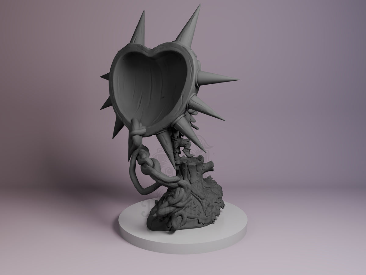 Back view of unpainted Masked Trickster resin Chibi figure from Tales of Daelz on a sculpted base.
