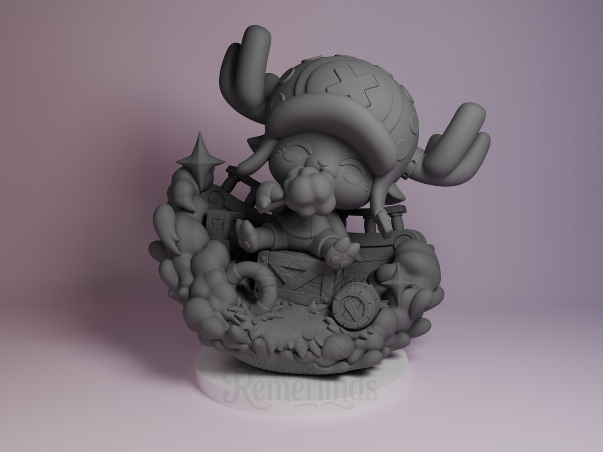Tony Chopper One Treasure Voyage 3D printed resin Chibi figure by Nomnom, unpainted front view. This 3D printed resin miniature figure of Tony Chopper from One Piece features a chibi style with a large head and joyful closed-eyes expression. The character is seated on a dynamic base composed of wooden crates, a barrel, and swirling smoke or splash effects, enhancing a playful scene. The oversized hat with antlers and the detailed base elements add depth and personality to the miniature.