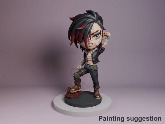 Vi from Arcane resin Chibi figure painted in black, red, and gold, standing on circular base with fist raised, purple background.