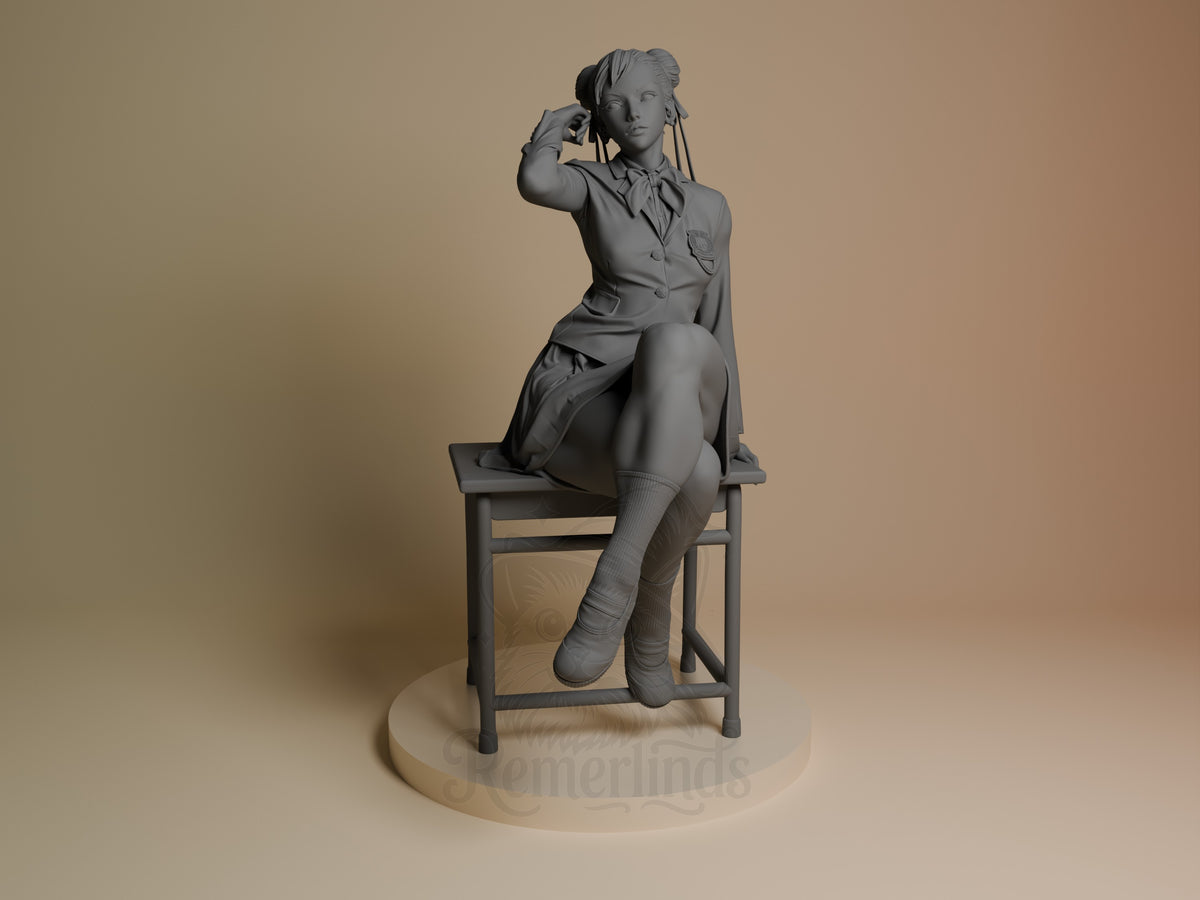 Chun-Li from Street Fighter resin figure seated on chair, front view, unpainted gray finish, detailed clothing and hair sculpting, round base included.