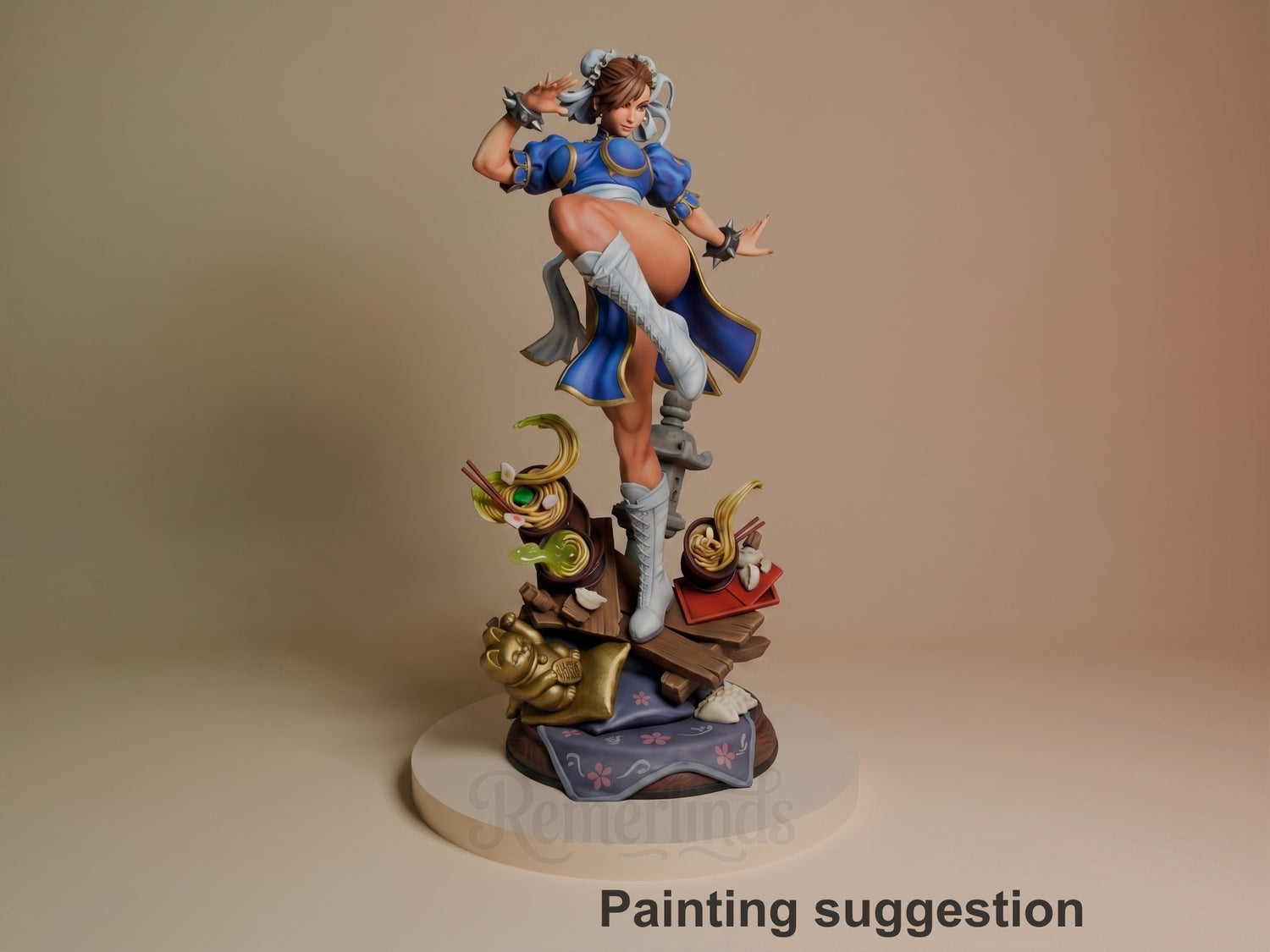 Chun-Li resin figure in blue combat outfit posed dynamically on decorative base with gold accents and Asian-inspired elements, fully painted.