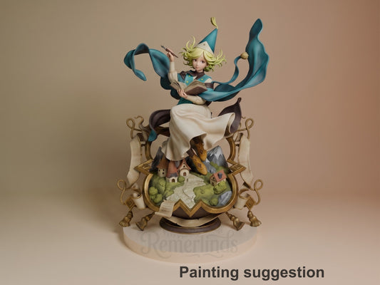 Painted resin figure of Coco from Witch Hat Atelier posed dynamically atop an ornate base with miniature castle scenery, blonde hair flowing with blue fabric swirling around her.