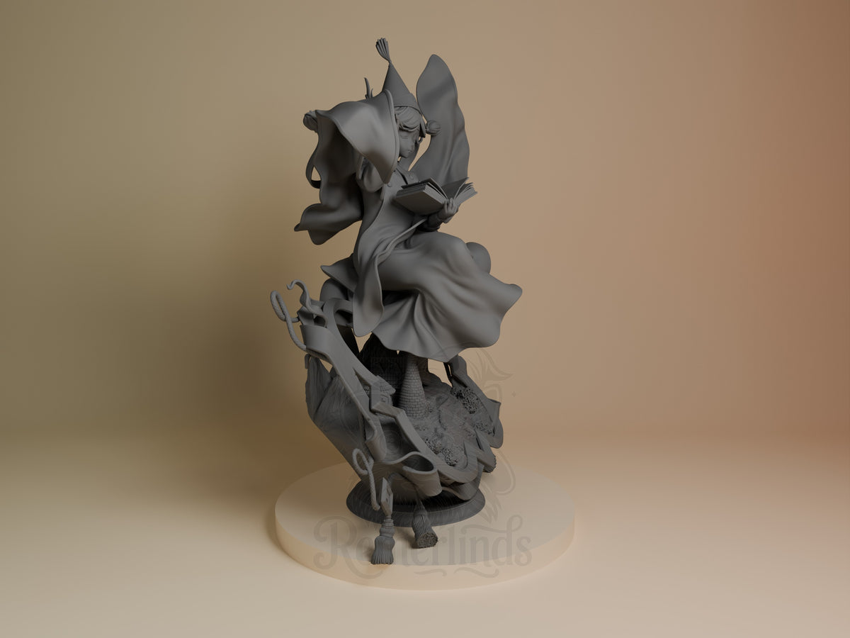 Coco from Witch Hat Atelier resin figure shown from the right side, unpainted gray with flowing robes and staff, mounted on round base.