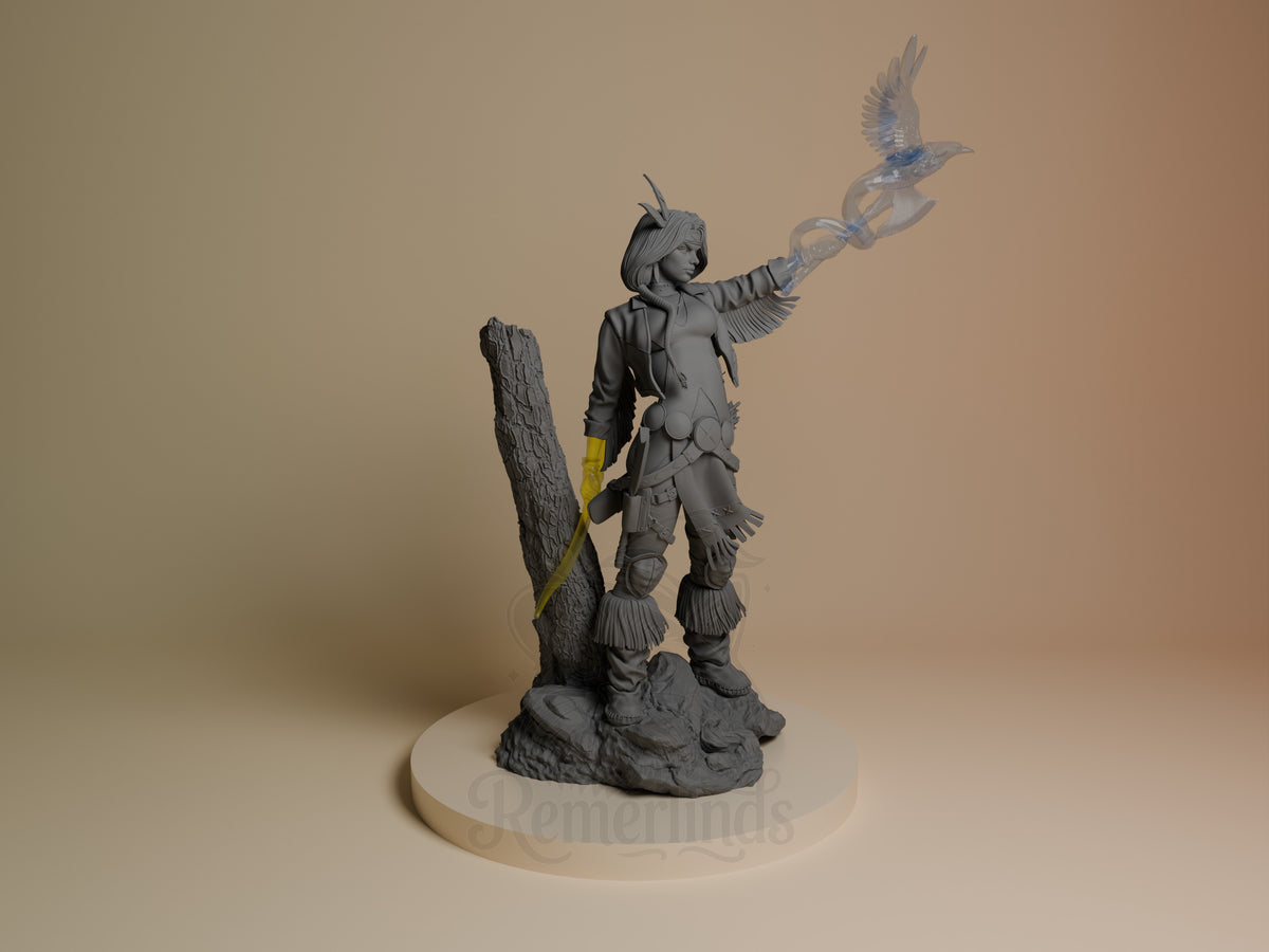 Spirit Arrow resin figure posed with arm raised, blue bird perched on gauntlet, holding feathered staff, on rocky base with yellow accent detail.