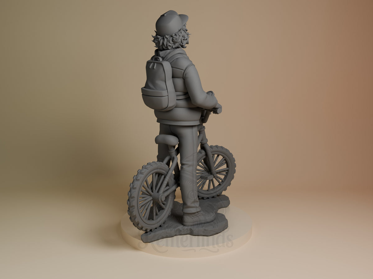 Dustin from Stranger Things is shown from the back as an unpainted resin figure with backpack, bicycle, and sculpted base.