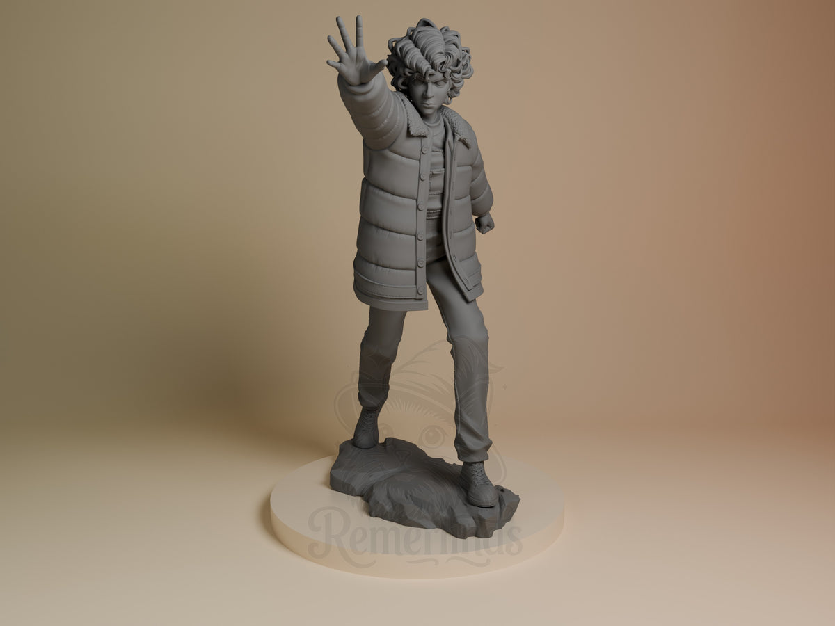 Eleven from Stranger Things resin figure, unpainted, reaches forward on a sculpted base.
