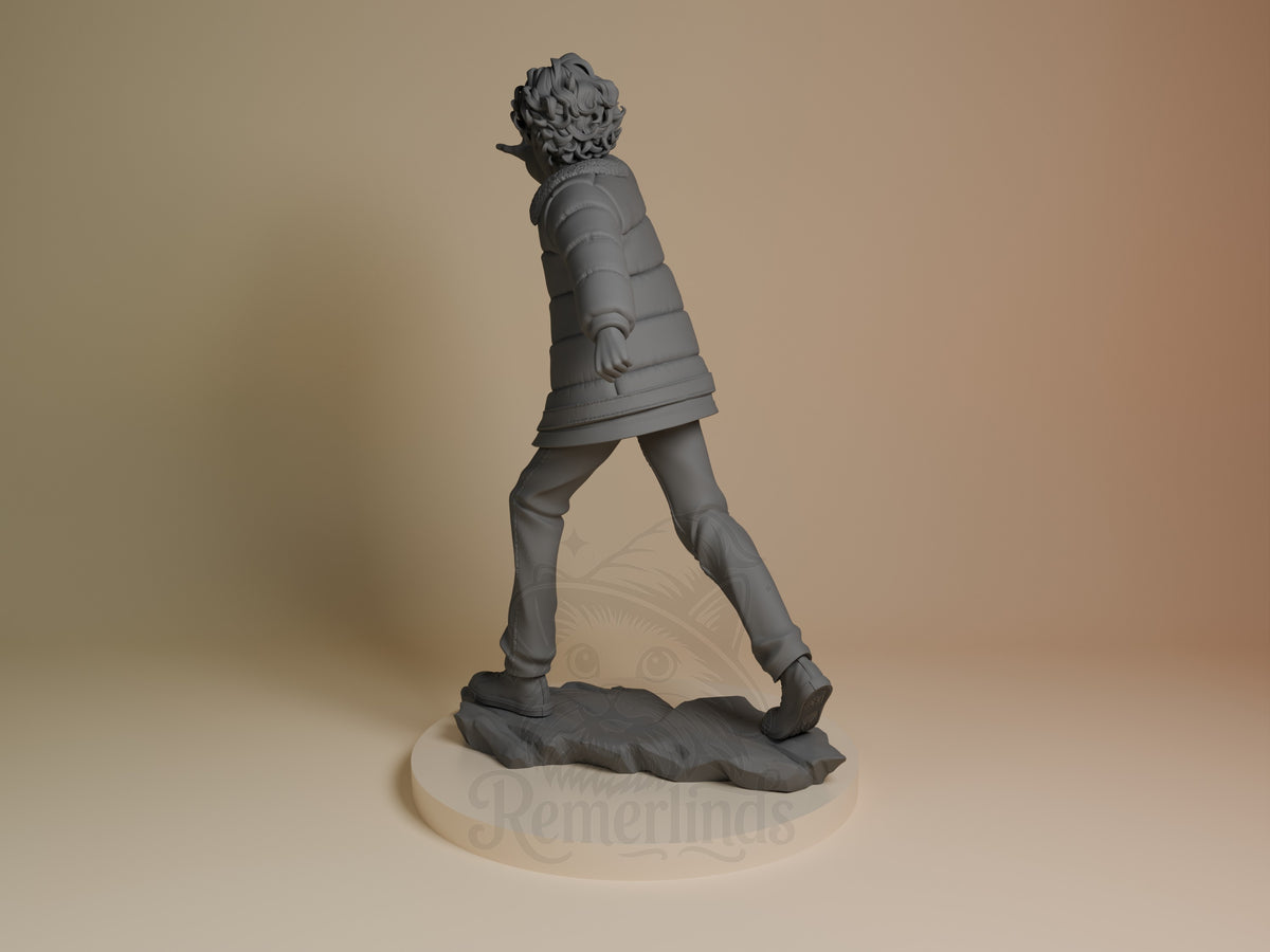 Unpainted resin figure of Eleven from Stranger Things in rear-left view on a rocky base.