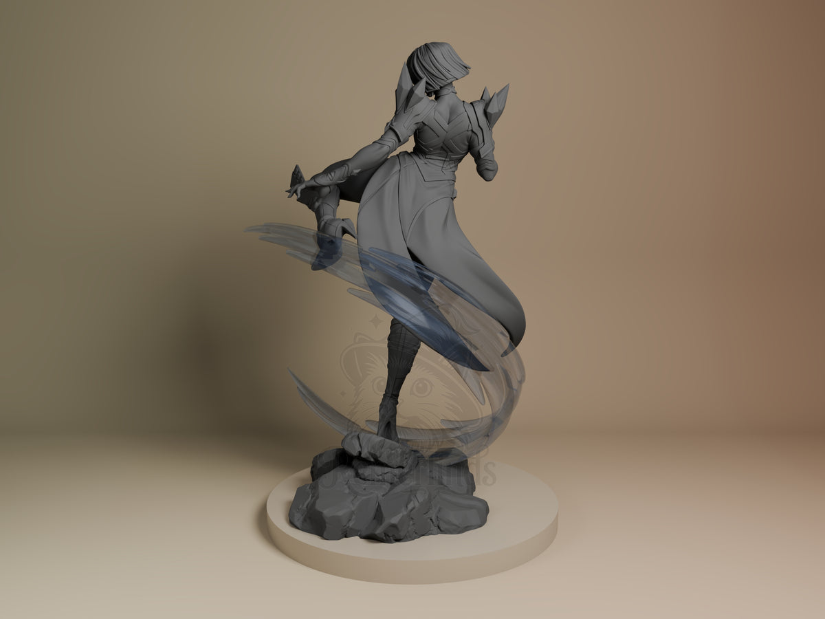 Arctic Telepath resin figure in dynamic pose on rocky base, shown from left angle with flowing cape and raised arm, unpainted gray finish.