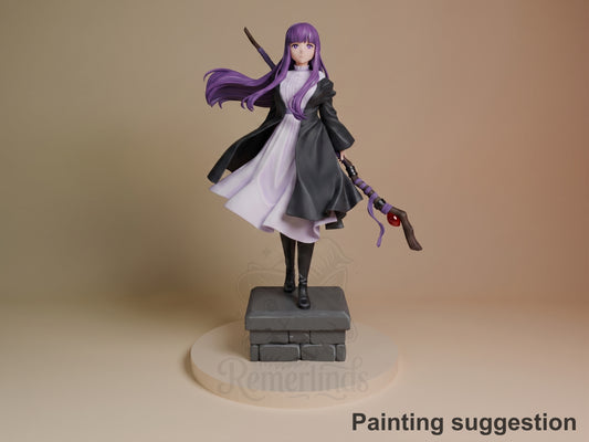 Fern resin figure from Frieren: Beyond Journey's End in painted purple hair, black coat and white dress, standing on stone base with sword.