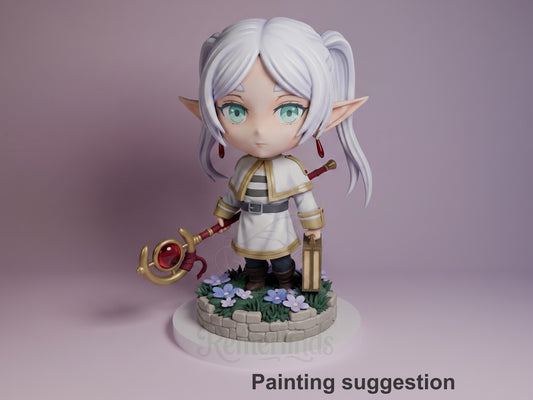 Painted resin Chibi figure of Frieren from Frieren: Beyond Journey's End, posed frontally holding a magical staff, wearing white and gold robes with pointed elf ears, on a flower-decorated base.