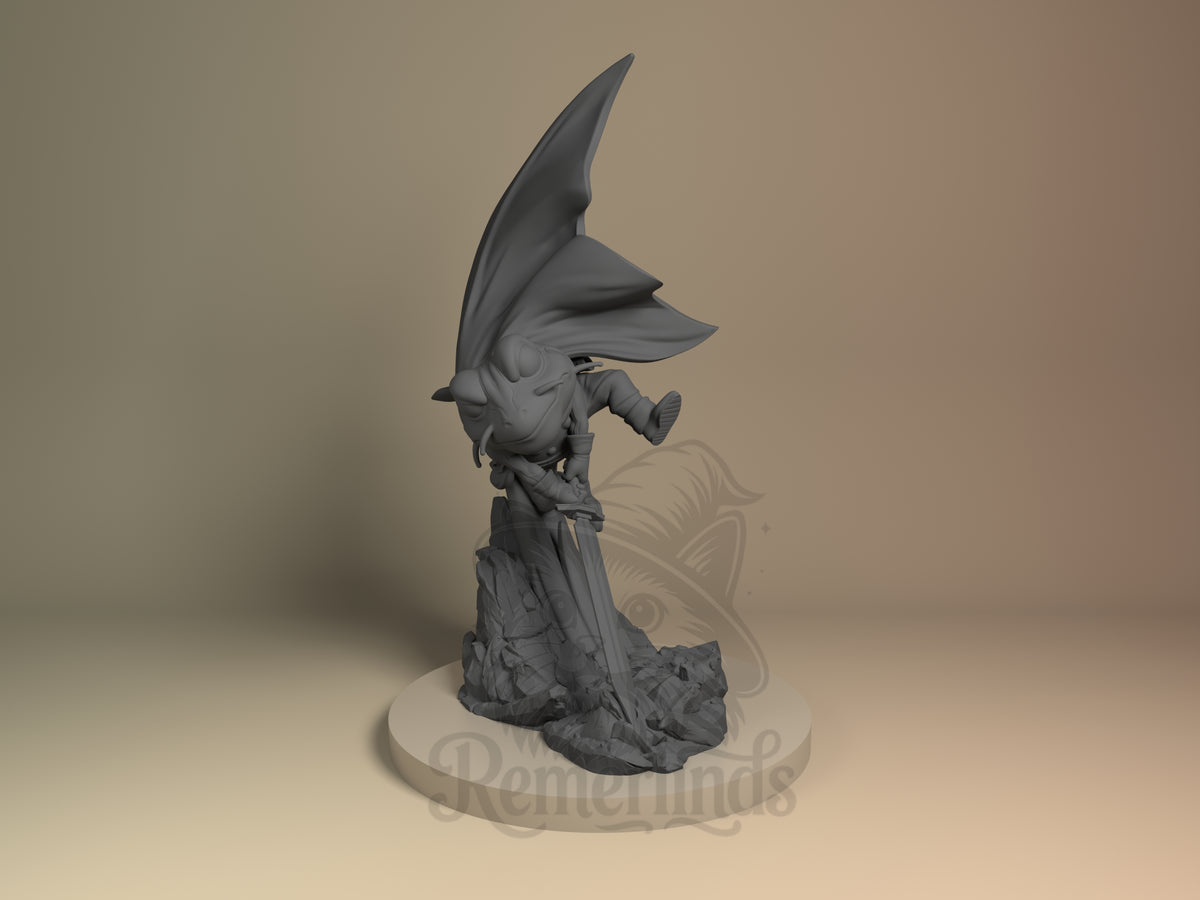 Frog Chrono Trigger 3D printed resin figure by Nomnom, unpainted front view. This 3D printed resin miniature figure depicts Frog from Chrono Trigger in a dramatic, action-oriented pose, leaning forward with his sword plunged into a rocky base. The figure features detailed armor and a large billowing cape that adds a sense of movement. The composition emphasizes readiness for battle, with the character's pose and props creating a dynamic and heroic scene.