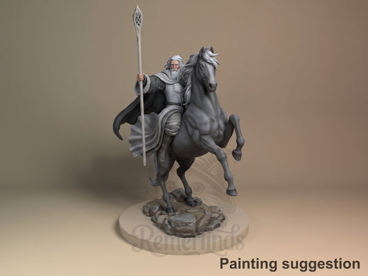 Painted Gandalf from Lord of the Rings resin figure rides a rearing horse, staff raised, on a rocky base.