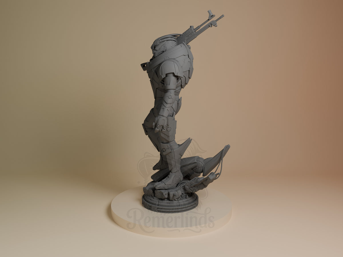 Garrus resin figure from Mass Effect shown at angle, displaying armored torso and head with rifle, mounted on circular base, unpainted gray finish.