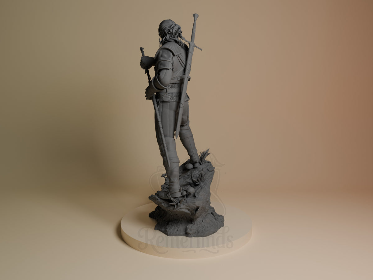 Geralt of Rivia resin figure shown from left side, standing on rocky base with sword raised, unpainted gray finish, detailed armor and weapons visible.