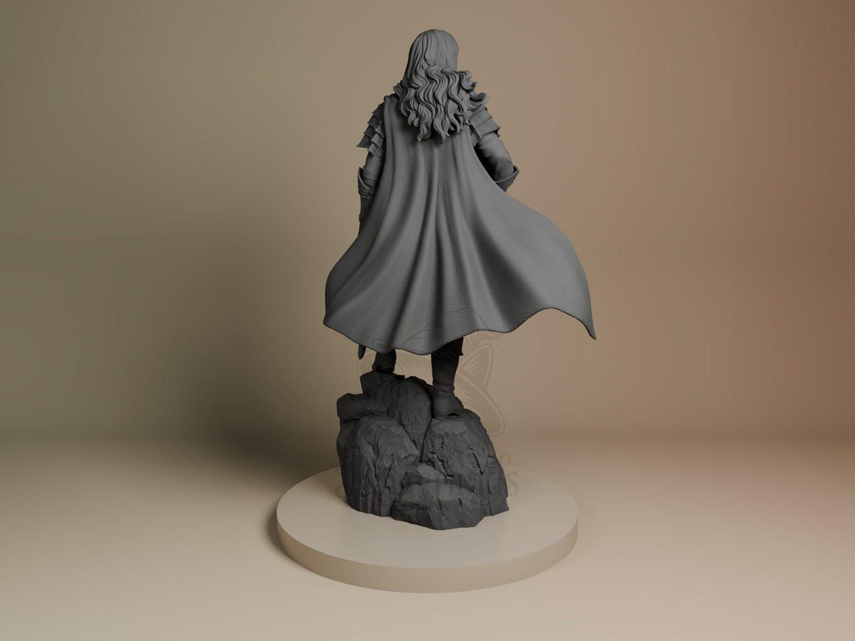 Back view of Griffith from Berserk, an unpainted resin figure on a rocky base.