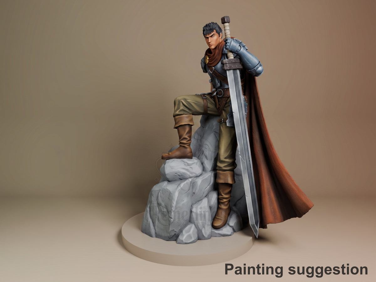 Guts resin figure from Berserk, painted, standing on rocky base with large sword, wearing armor and cape, three-quarter view.