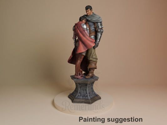 A painted resin figure of Guts and Casca from Berserk embraces on a sculpted stone base.
