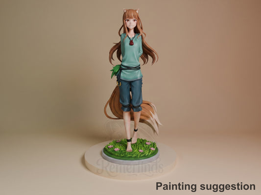 Holo resin figure from Spice and Wolf, painted and posed standing on grass base, brown hair with wolf ears, wearing teal top and blue pants.