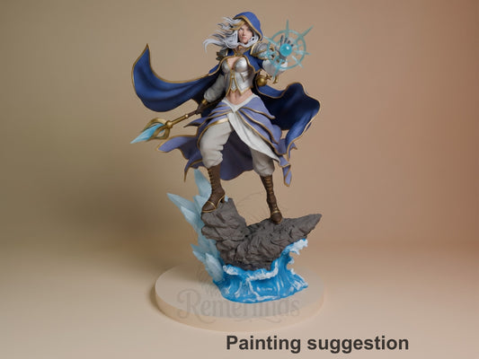 A painted resin Jaina Proudmoore figure from World of Warcraft poses with staff and magic on a sculpted icy base.