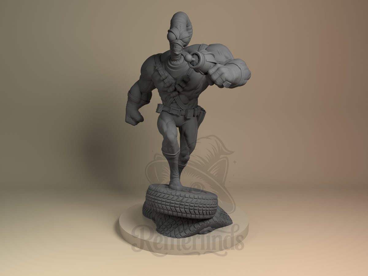 Anthropomorphic Worm Hero Armored Worm Hero 3D printed resin figure by Nomnom, unpainted front view. This 3D printed resin miniature figure depicts an anthropomorphic worm hero in a dynamic running forward pose, holding a large futuristic gun in one hand and clenching the other fist. The character is muscular, wearing a crossed bandolier with ammunition and armored gauntlets, while standing atop a base composed of stacked tires, adding environmental context and emphasizing action.
