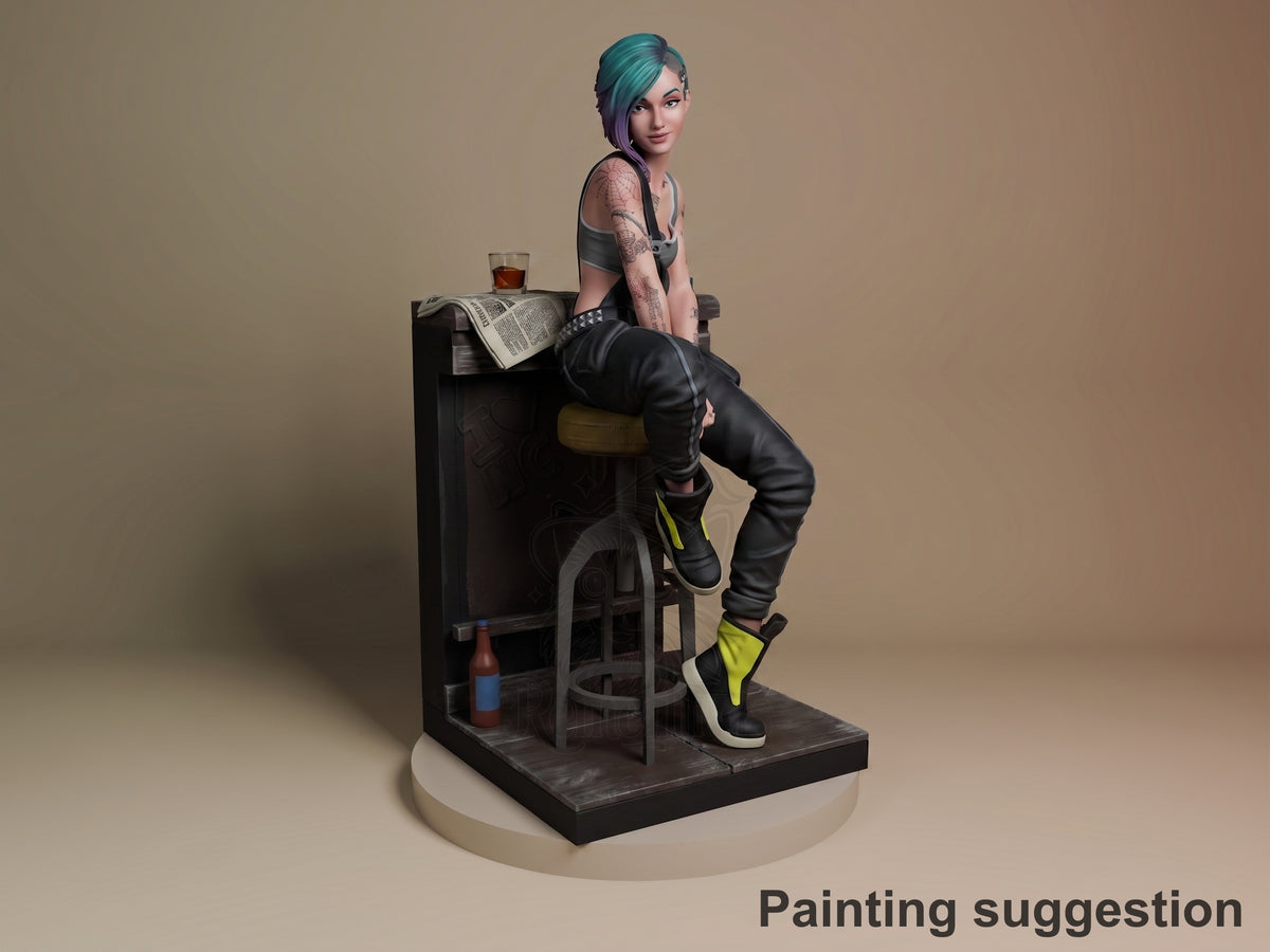 Painted Judy from Cyberpunk 2077 resin figure sits on stool atop sculpted base.