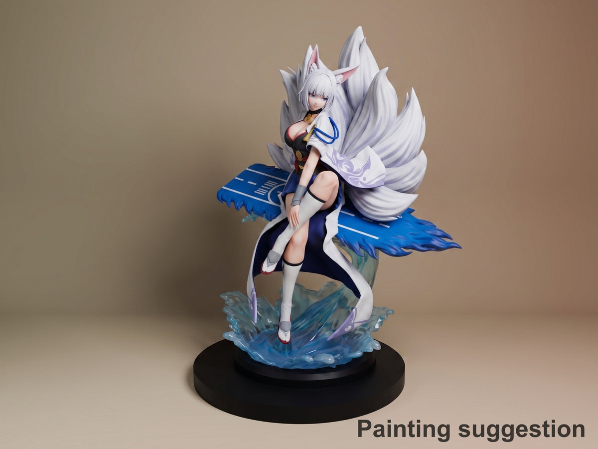 Kaga from Azur Lane painted resin figure standing on blue water base, white hair and wings, black outfit, dynamic pose.