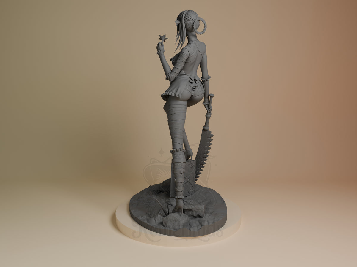 Kainé from NieR: Automata is an unpainted resin figure viewed from behind with sword and rocky base.