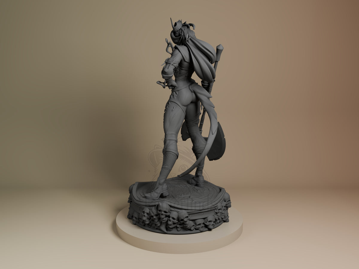 Karlach resin figure from Baldur's Gate in dynamic standing pose with flowing cape, unpainted gray finish, ornate base, viewed from left angle.