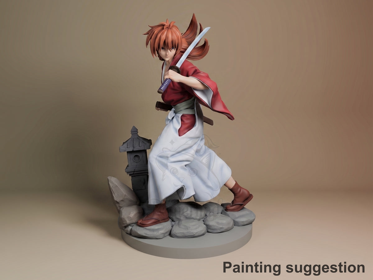 Painted Kenshin from Samurai X resin figure in three-quarter view holds a sword over rocks and shrine.