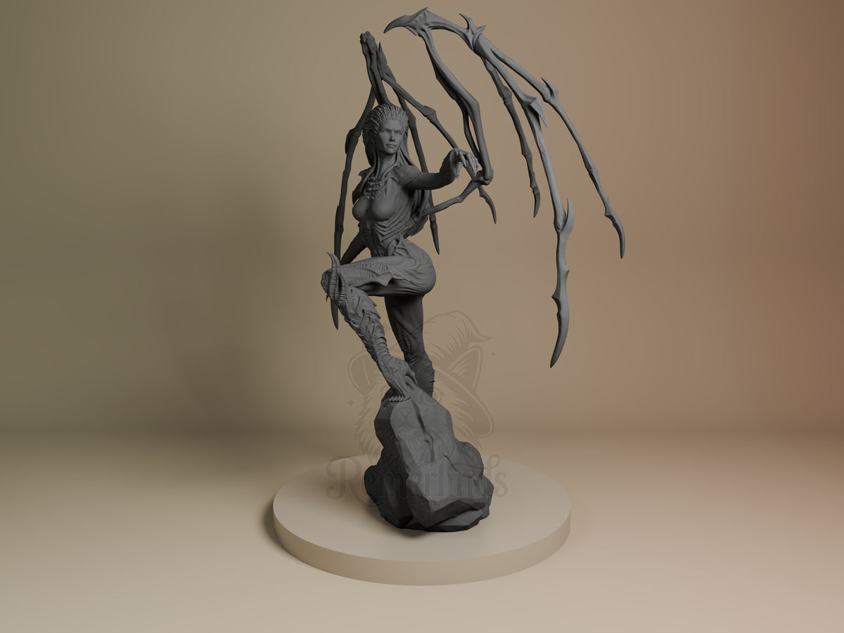 Kerrigan from Starcraft II, an unpainted resin figure, faces front with raised wings on a sculpted base.