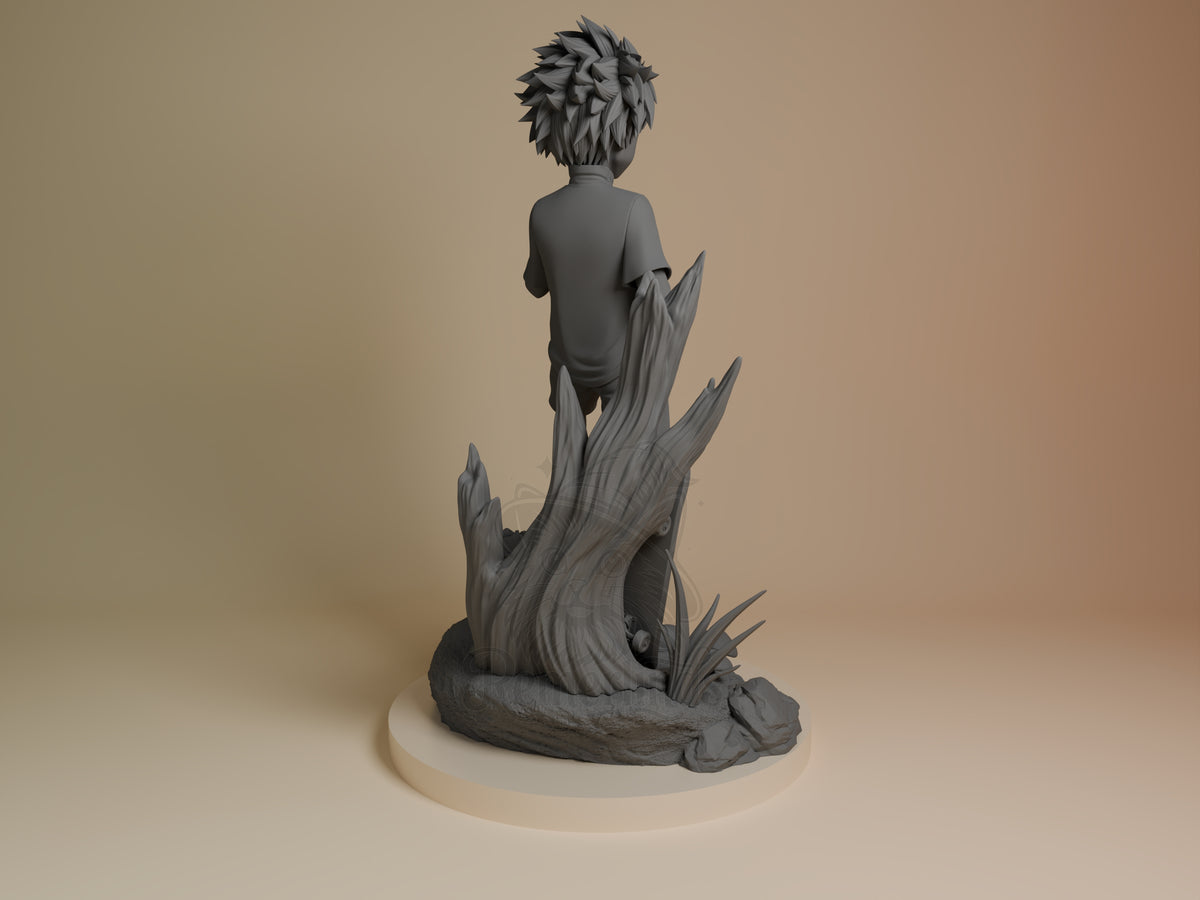 Back view of Killua from Hunter x Hunter, an unpainted resin figure with spiky hair on a sculpted rocky base.