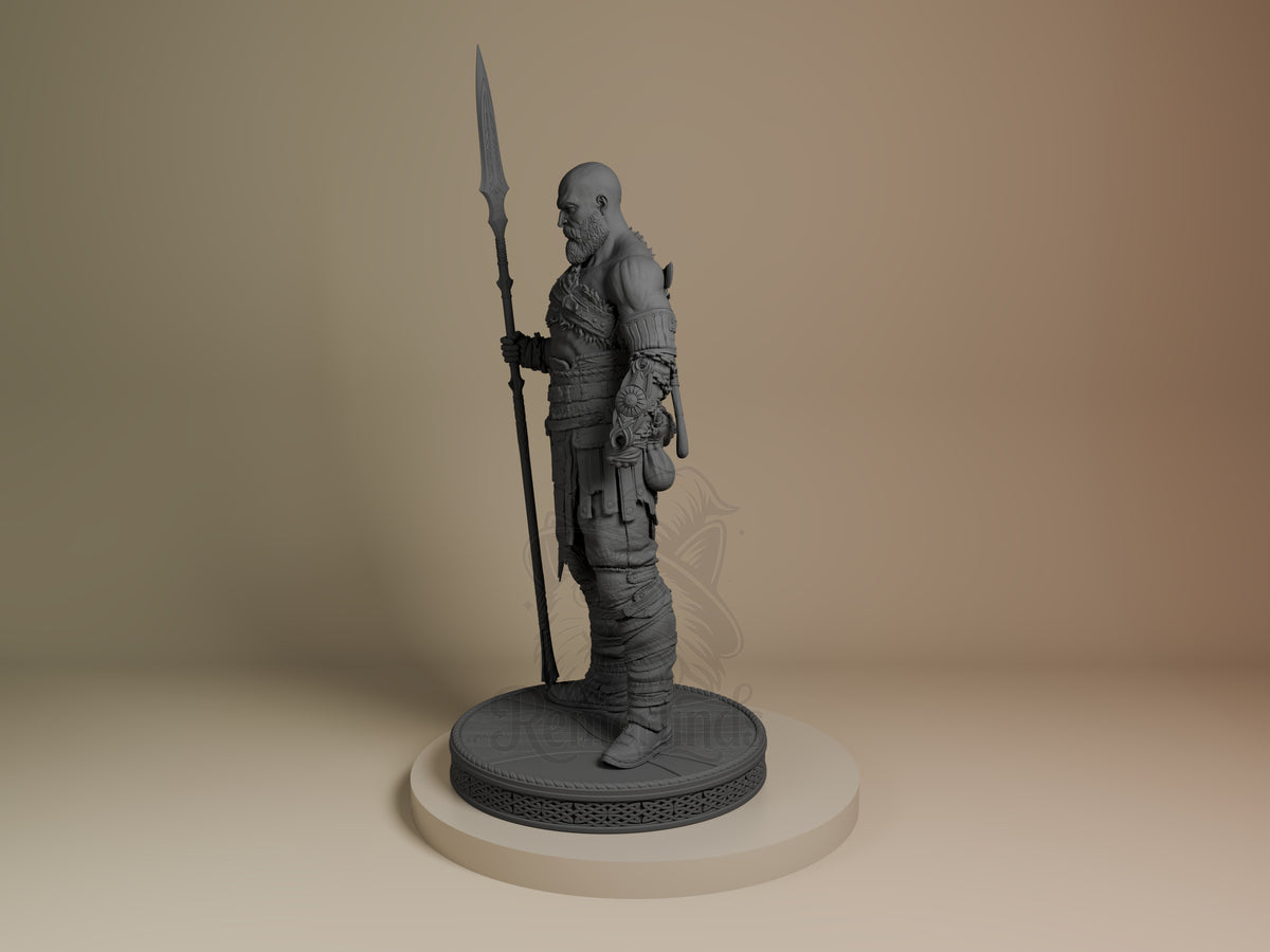 Kratos resin figure in gray primer shown at angle, holding spear aloft, detailed armor and wrappings on cream base.